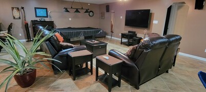 Cozy & quiet 1 Bedroom apartment with pool table and big screen TV.