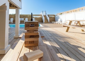 A heated pool - Hobbs Realty - Luxury Oceanfront Home w/Heated Pool, Game Room, and Elevator (Holden Beach)