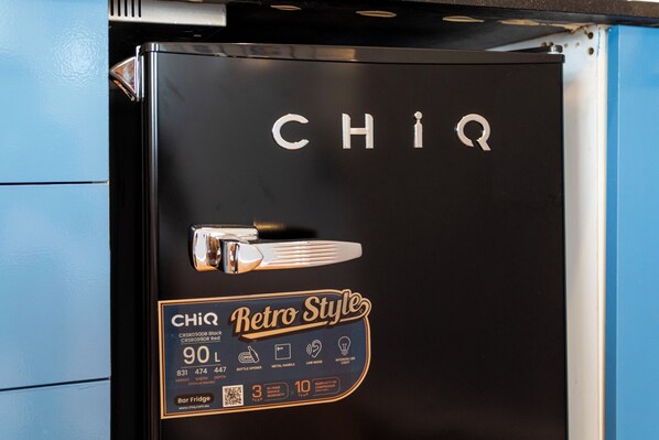 A black refrigerator with the brand name "CHIQ" and the model "Retro Style" visible on its front. - GIA Sydney (Sydney)