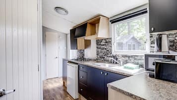 Réfrigérateur, micro-ondes, plaque de cuisson, cafetiÚre/bouilloire