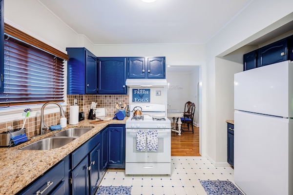 Whip up your favorite dishes in this full kitchen with plenty of supplies.