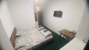 Habitación básica con 1 cama matrimonial o 2 individuales, para no fumadores | Wifi gratis