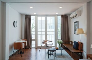 Premier Studio with Balcony | Minibar, in-room safe, desk, laptop workspace - Nexus House Cay Diep - Near Independence Palace (Ho Chi Minh City)