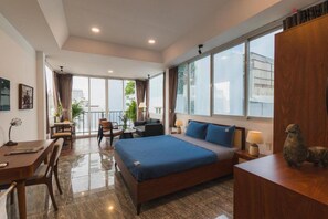 Studio, Balcony | Minibar, in-room safe, desk, laptop workspace - Nexus House Cay Diep - Near Independence Palace (Ho Chi Minh City)