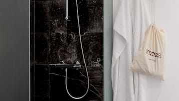 Shower, eco-friendly toiletries, hair dryer, towels