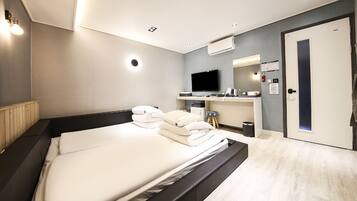 Family Triple Room, City View | Egyptian cotton sheets, premium bedding, down duvets, memory-foam beds