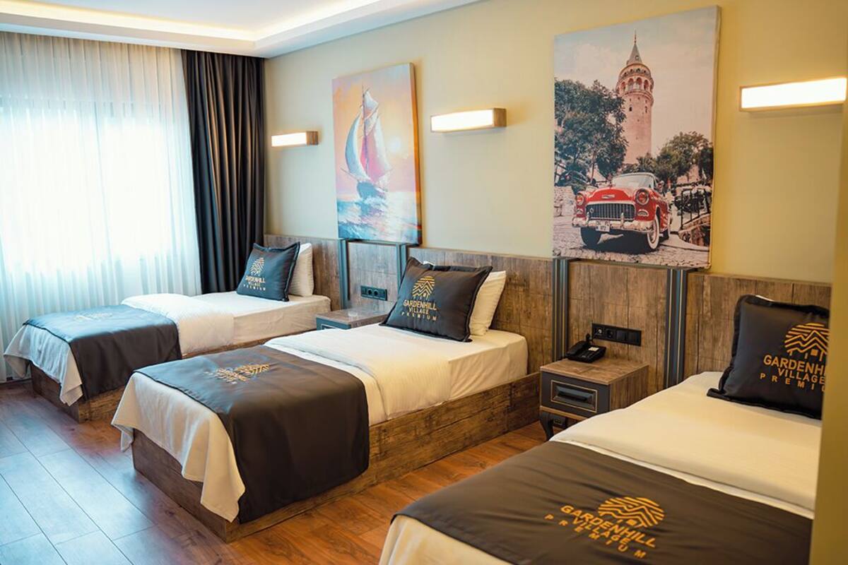Comfort Triple Room | Hypo-allergenic bedding available, minibar, in-room safe