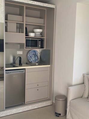 Mini-fridge, microwave, espresso maker, electric kettle