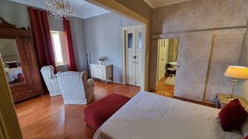 1 bedroom, desk, iron/ironing board, travel crib