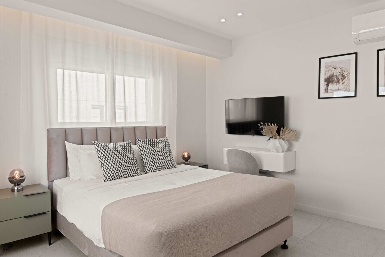 1 غرفة نوم ومكواة/لوح كي وواي فاي وملاءات أسرّة