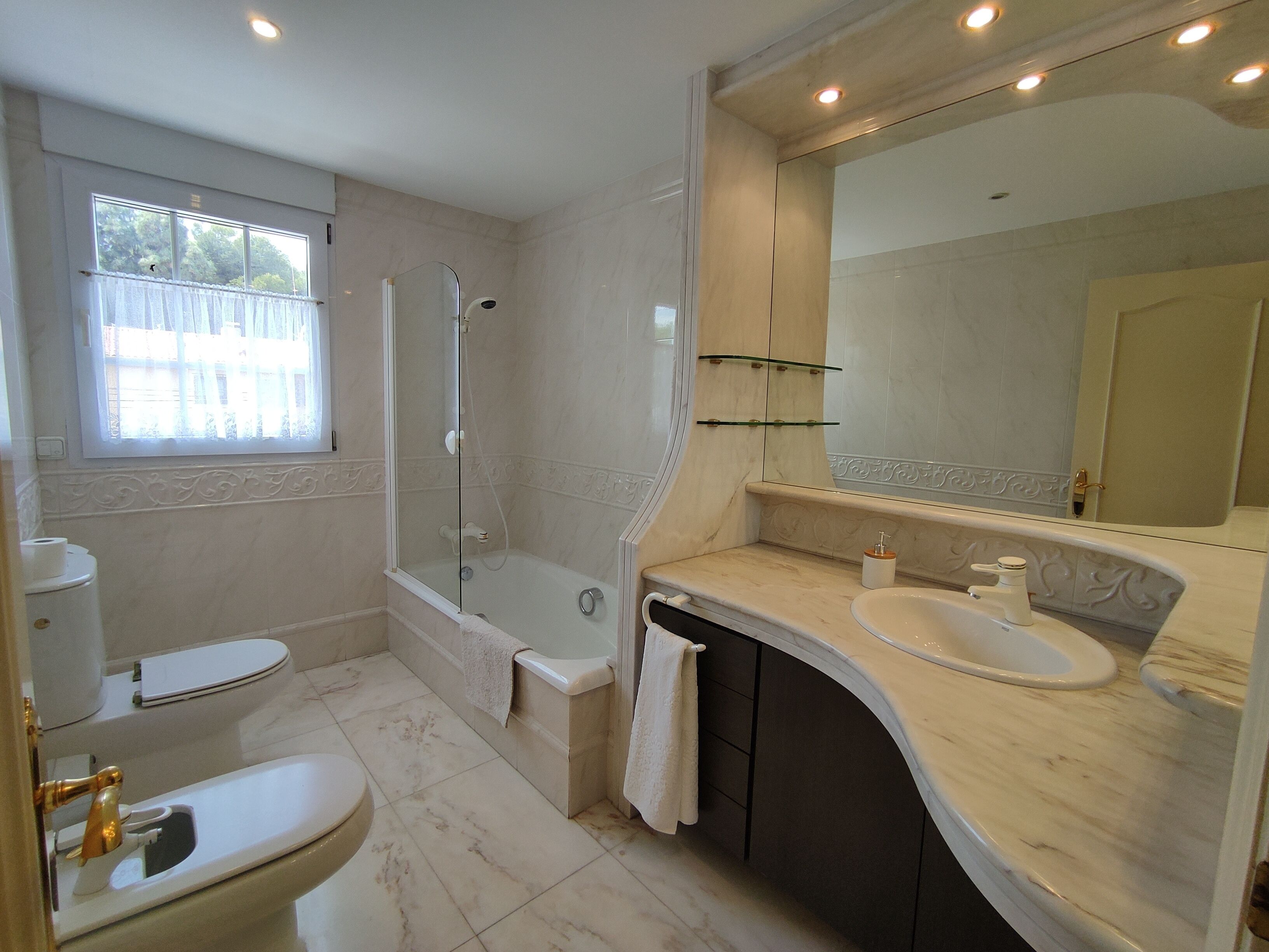 Hair dryer, towels, soap, toilet paper