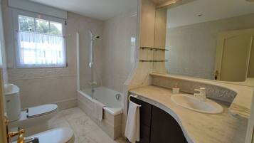 Hair dryer, towels, soap, toilet paper