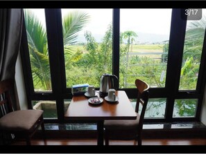 Deluxe Double Room, 1 King Bed, Garden View | Hypo-allergenic bedding, in-room safe, blackout curtains - A Thia Homestay (Dien Bien Phu)
