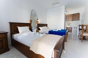 Classic Triple Room, Pool Access, Pool View | Frette Italian sheets, premium bedding, memory-foam beds, in-room safe - Dodomar Selection (Santorini)