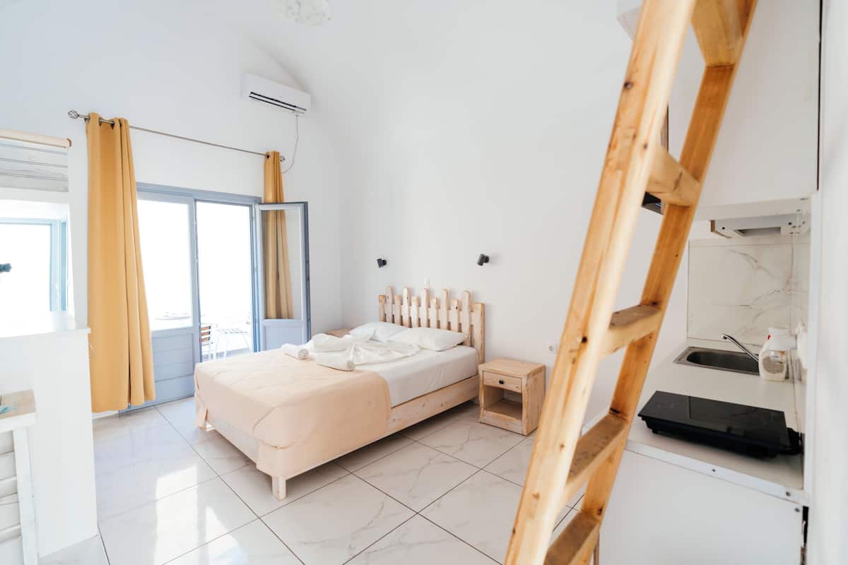 Suíte estúdio família, sacada, vista para a montanha | Lençóis italianos Frette, roupas de cama premium