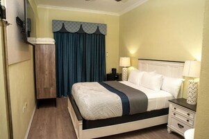 Deluxe Room, Pool View | Bathroom | Shower, towels, toilet paper