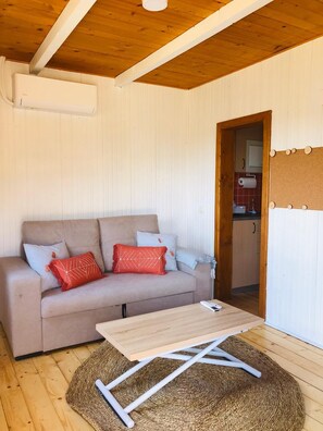 Casa de campo, vista para o jardim | Área de estar