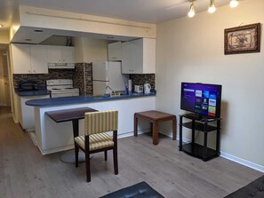 Private kitchen - Furnished one-bedroom apartment near Gerrard and Greenwood, East York (Toronto)