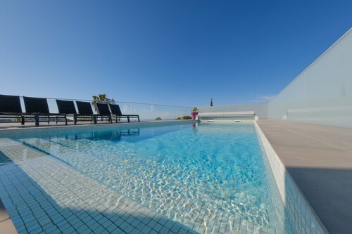 Modern villa with sea view [27]