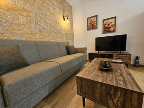 Deluxe Apartment, Courtyard View | Living area - Honeywell Comfort Stay (Markopoulo Mesogaias)