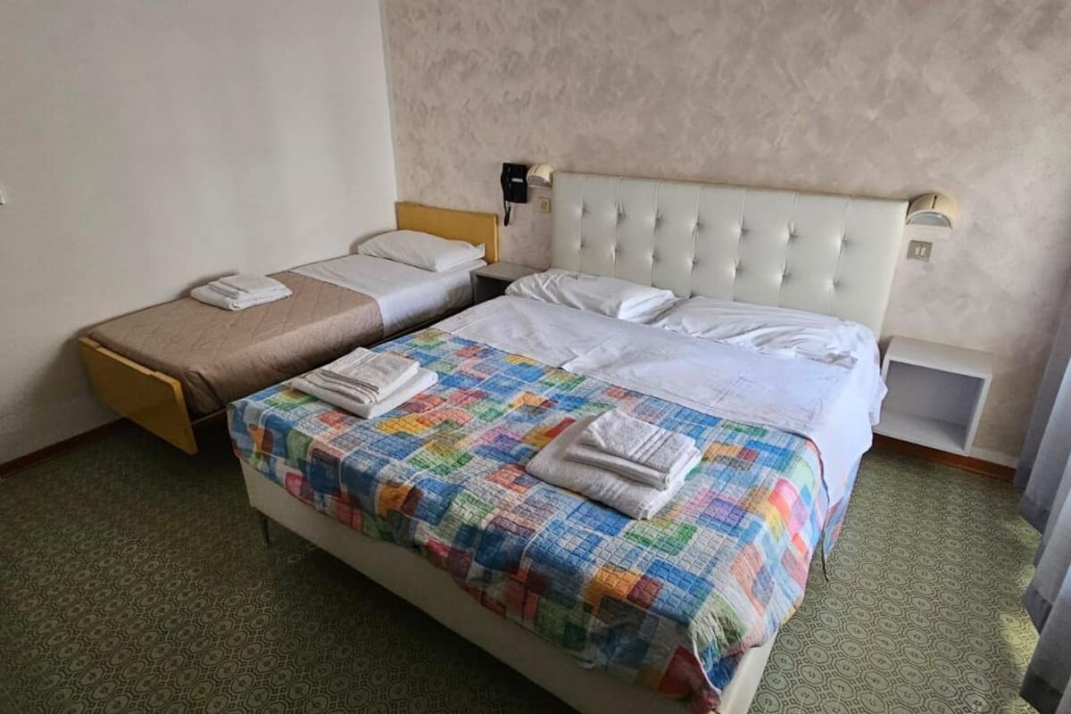 Basic Triple Room, Balcony, Beach View | Hypo-allergenic bedding, individually decorated, individually furnished