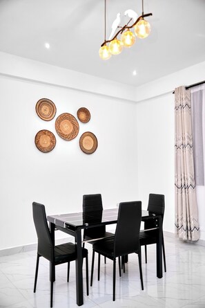 Dining - Quiet, cozy and family friendly apartment with lots of local cuisines around. (Arusha)