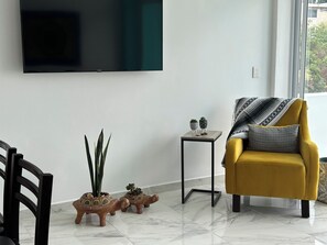 Apartment, Kitchen | Living area | Flat-screen TV - Carrizo apartment (Mazatlán)