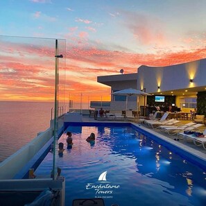 A heated pool - New 3 Bedroom Private First Floor Corner Condo (Playa Encanto)