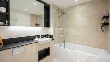 Hair dryer, towels, soap, shampoo