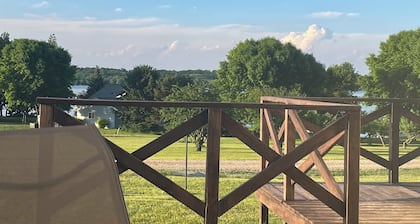Big Stone Lake views and next door access to public boat ramp.