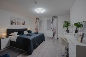 1 bedroom, desk, iron/ironing board, travel cot