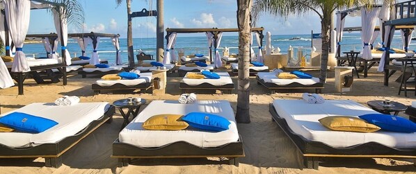Private beach, free beach cabanas, sun loungers, beach towels