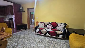 Familienapartment | Wohnbereich | LCD-Fernseher