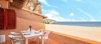 Holiday Home 'Appartamento Li Tamerici' with Shared Terrace and Air Conditioning