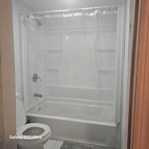 Hair dryer, towels, soap, toilet paper - "Charming Suite with 2 Queen Beds – Ideal for Families!" (Irvington)