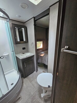 Shower, towels, soap, shampoo