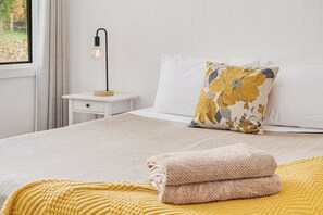 2 habitaciones, tabla de planchar con plancha, cuna de viaje y wifi