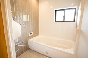 Hair dryer, bidet, towels, soap