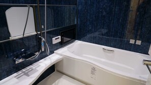 Jetted bath, hair dryer, bathrobes, slippers