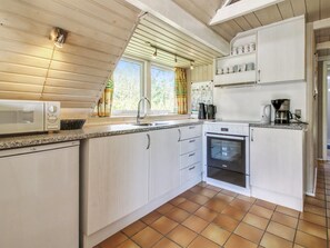 Fridge, microwave, cookware/dishes/utensils