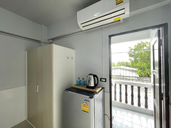 Standard Room, City View | Mini-refrigerator
