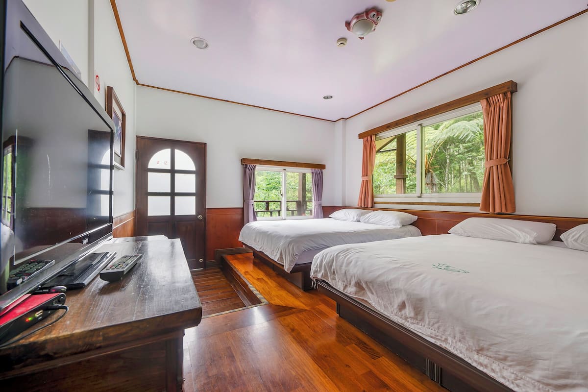 Standard Quadruple Room | Blackout curtains, bed sheets