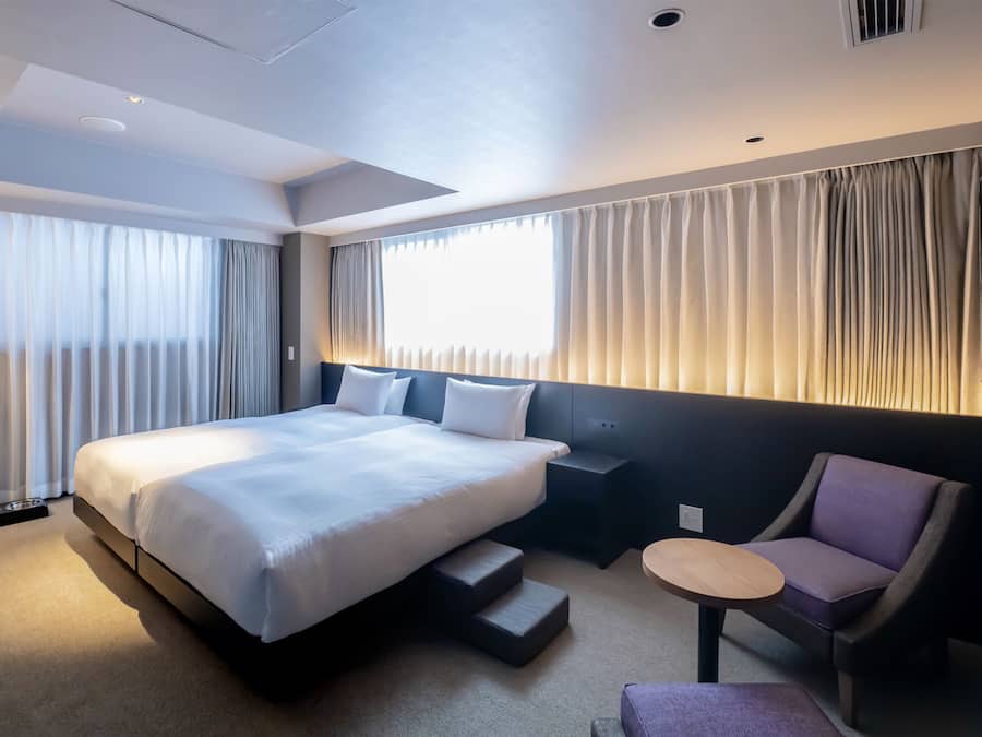 Kamar Twin Deluks, Bebas Asap Rokok (Dog Friendly) | Selimut bulu angsa, brankas, tirai kedap cahaya, dan Wi-Fi gratis