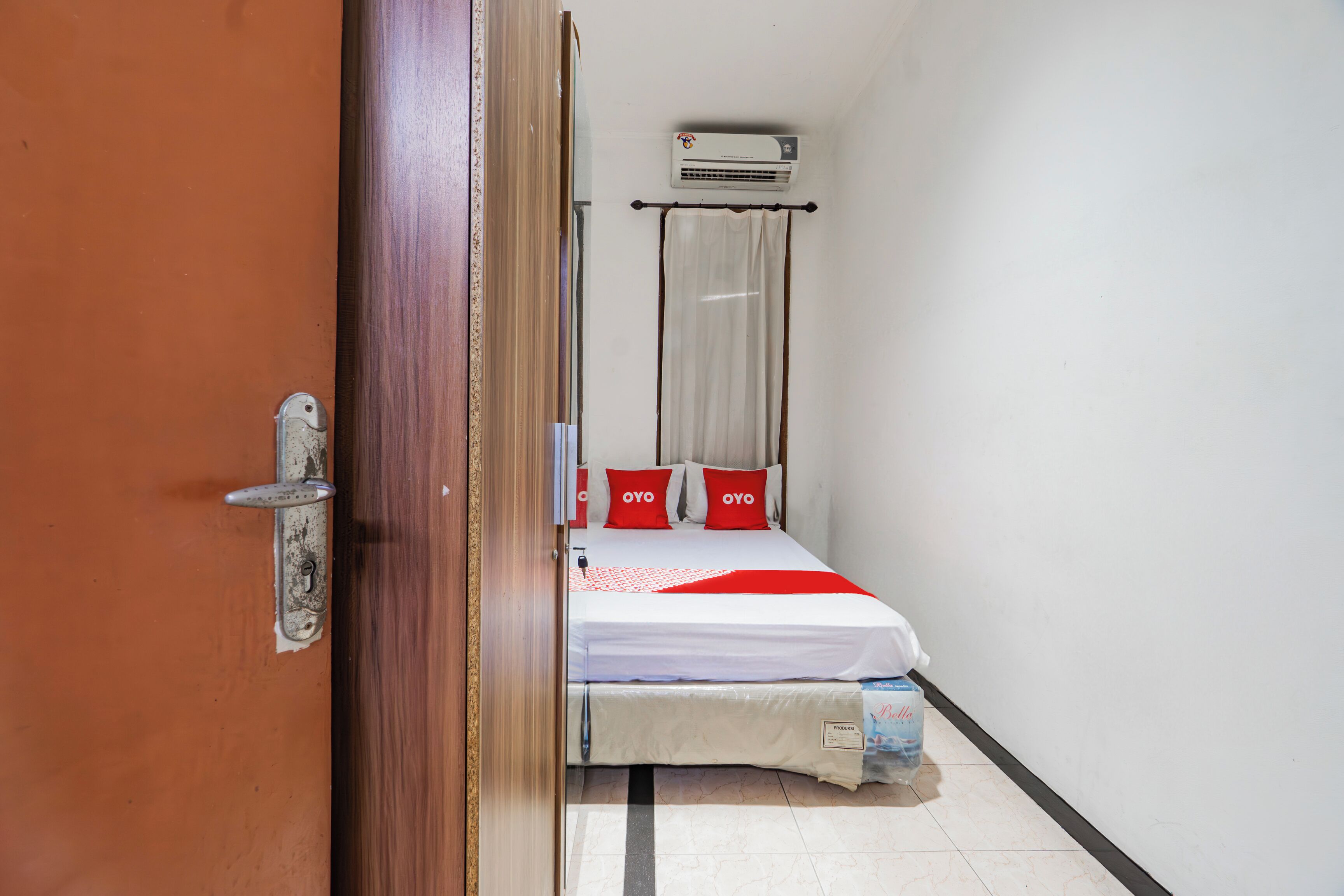 Kamar Double Standar | Wi-Fi gratis dan seprai linen