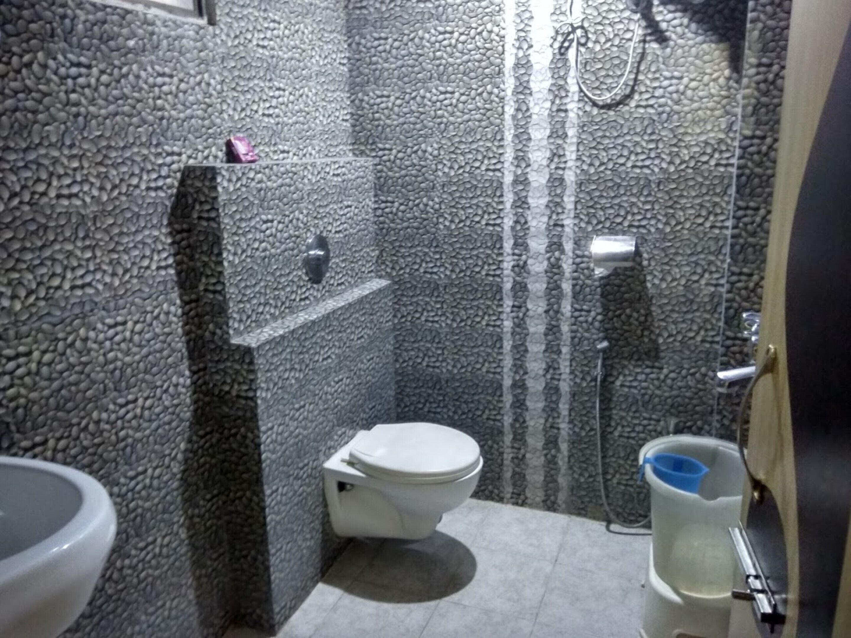 Shower, rainfall showerhead, towels, soap