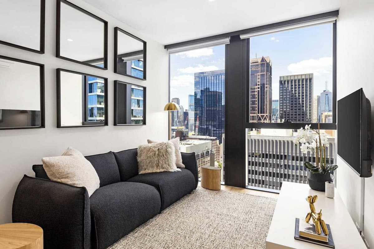 Deluxe Apartment, 1 Queen Bed, City View | Living area | 32-inch Smart TV with digital channels, Netflix, streaming services