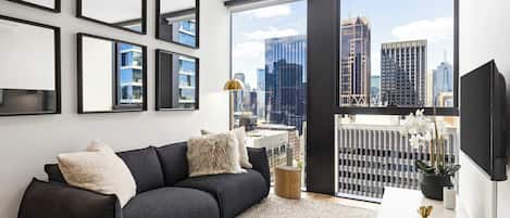 Deluxe Apartment, 1 Queen Bed, City View | Living area