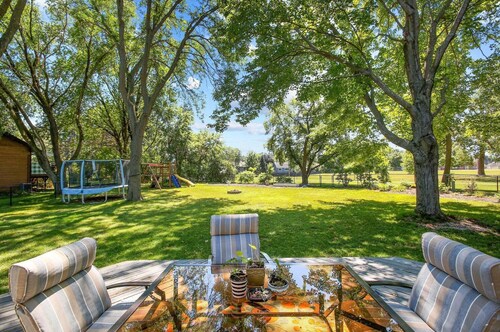 5 Bedroom family oriented home. Fenced yard, Adjacent park.
