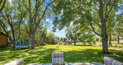 5 Bedroom family oriented home. Fenced yard, Adjacent park.