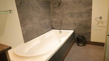 Shower, rainfall showerhead, towels, soap